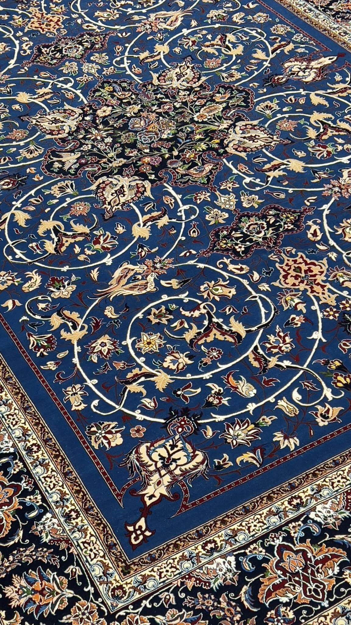 "Artistic Persian rug crafted in Isfahan by Master Bagher Seirafian."
